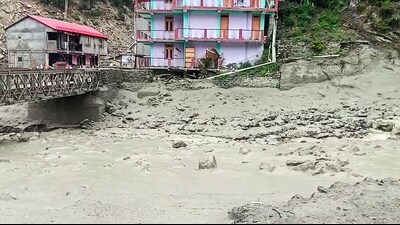 A view of scattered debris at the irrigation bridge in the Rip Tejer area after heavy rains caused flooding in canals, in Kinnaur on Thursday. (ANI Video Grab) A view of scattered debris at the irrigation bridge in the Rip Tejer area after heavy rains caused flooding in canals, in Kinnaur on Thursday. (ANI Video Grab)