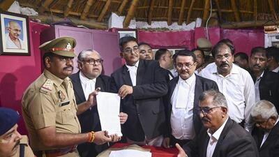 Lawyers of the Faizabad Bar Association submitting a complaint with the police in Ayodhya on Thursday. (PTI PHOTO) Lawyers of the Faizabad Bar Association submitting a complaint with the police in Ayodhya on Thursday. (PTI PHOTO)