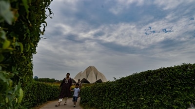Gram it: Isn't it the perfect weather to go for a walk? With the clouds hovering over the skies at the Lotus Temple, Delhiites have got just the perfect reason to soak in the monsoon vibe. (Photo: Sanchit Khanna/HT)