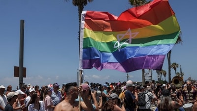Interestingly, the movement to secure the rights of LGBTQ people is being instrumentalised to cover up its mass killing of Palestinians. ([Photo credit: AFP])