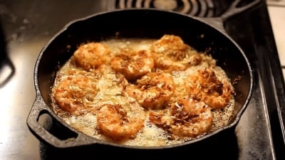 This delicious butter garlic prawns recipe by Sanjeev Kapoor is a must-try. (Pinterest (representative image) ) This delicious butter garlic prawns recipe by Sanjeev Kapoor is a must-try. (Pinterest (representative image) )