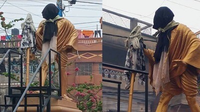 কাটোয়া স্টেশনবাজার চৌরাস্তার মোড়ে থাকা গান্ধীজির মূর্তির মুখ কালো কাপড়ে ঢাকা কাটোয়া স্টেশনবাজার চৌরাস্তার মোড়ে থাকা গান্ধীজির মূর্তির মুখ কালো কাপড়ে ঢাকা