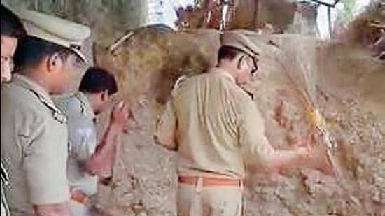 Police search for cash in a haystack in Ayodhya’s Rudauli. (SOURCED)