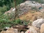 According to residents, on Wednesday afternoon, they saw an earthmover uprooting trees near the C&D site. (HT)