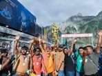 Locals welcome Amarnath pilgrims with roses as yatris arrive at Baltal base camp, in Ganderbal on Thursday.