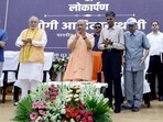 CM Yogi Adityanath inaugurated the state-of-the-art new campus of Dr Ram Manohar Lohia Uttar Pradesh Academy of Administration and Management in Lucknow on Friday. (HT Photo)