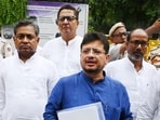 Ritabrata Banerjee (blue kurta) and members of a rebel faction of the Trinamool Congress (TMC) leave the office of the Election Commission of India (ECI) after meeting