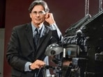 Siddiqui beside an old linotype machine in the lobby of The Toronto Star, in 2001. ‘Whose side was I on? Nobody’s,’ he says. ‘I had a point of view that was based on what I saw, which others either didn’t see or chose not to.’ (Getty Images)