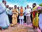 Union Rural Development Minister Shivraj Singh Chouhan, Andhra Pradesh Chief Minister N Chandrababu Naidu and Deputy Chief Minister Pawan Kalyan take part in the foundation stone-laying ceremony for a farm pond under the Viksit Bharat Guarantee for Rozgar and Aajivika Mission Gramin (VB-G RAMG), in Amaravati. (APDeputyCMO/X)