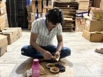 Young Aamir is eating rajma-roti while watching YouTube videos on his phone. (HT Photo) Young Aamir is eating rajma-roti while watching YouTube videos on his phone. (HT Photo)