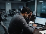 A man says his company is forcing remote workers to relocate or resign amid AI-linked job cuts.