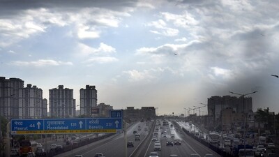 Gram it: Here's a dramatic view of the clouds stretching across an overcast sky, bringing the much-needed relief after a morning drizzle over the Delhi-Meerut Expressway in Ghaziabad. Expect the skies to present similar views today as the India Meteorological Department (IMD) has predicted light rain and thunderstorm for Saturday as well. (Photo: Sakib Ali/HT)