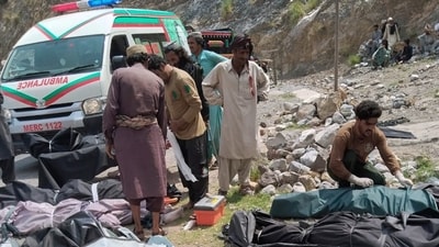 Rescue workers and volunteers cover bodies after recovering them after an overcrowded passenger bus plunged from a highway into a rocky ravine, in Dana Sar, a remote area near the border of Balochistan and Khyber Pakhtunkhwa provinces, in southwestern Pakistan, (AP) Rescue workers and volunteers cover bodies after recovering them after an overcrowded passenger bus plunged from a highway into a rocky ravine, in Dana Sar, a remote area near the border of Balochistan and Khyber Pakhtunkhwa provinces, in southwestern Pakistan, (AP)