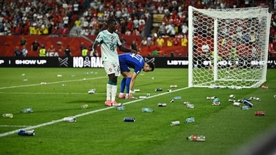Croatia fans threw litter on the pitch after VAR overturned a goal from Croatia's Josko Gvardiol. (REUTERS)