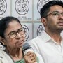 মমতা ও অভিষেক বন্দ্যোপাধ্যায়। (ফাইল ছবি, সৌজন্যে পিটিআই)