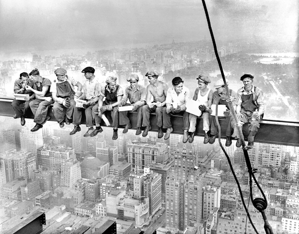 A defining image of American industrial ambition: Lunch Atop a Skyscraper (1932) by Charles Clyde Ebbets. The building became Manhattan’s Rockefeller Center. (Wikimedia Commons) A defining image of American industrial ambition: Lunch Atop a Skyscraper (1932) by Charles Clyde Ebbets. The building became Manhattan’s Rockefeller Center. (Wikimedia Commons)