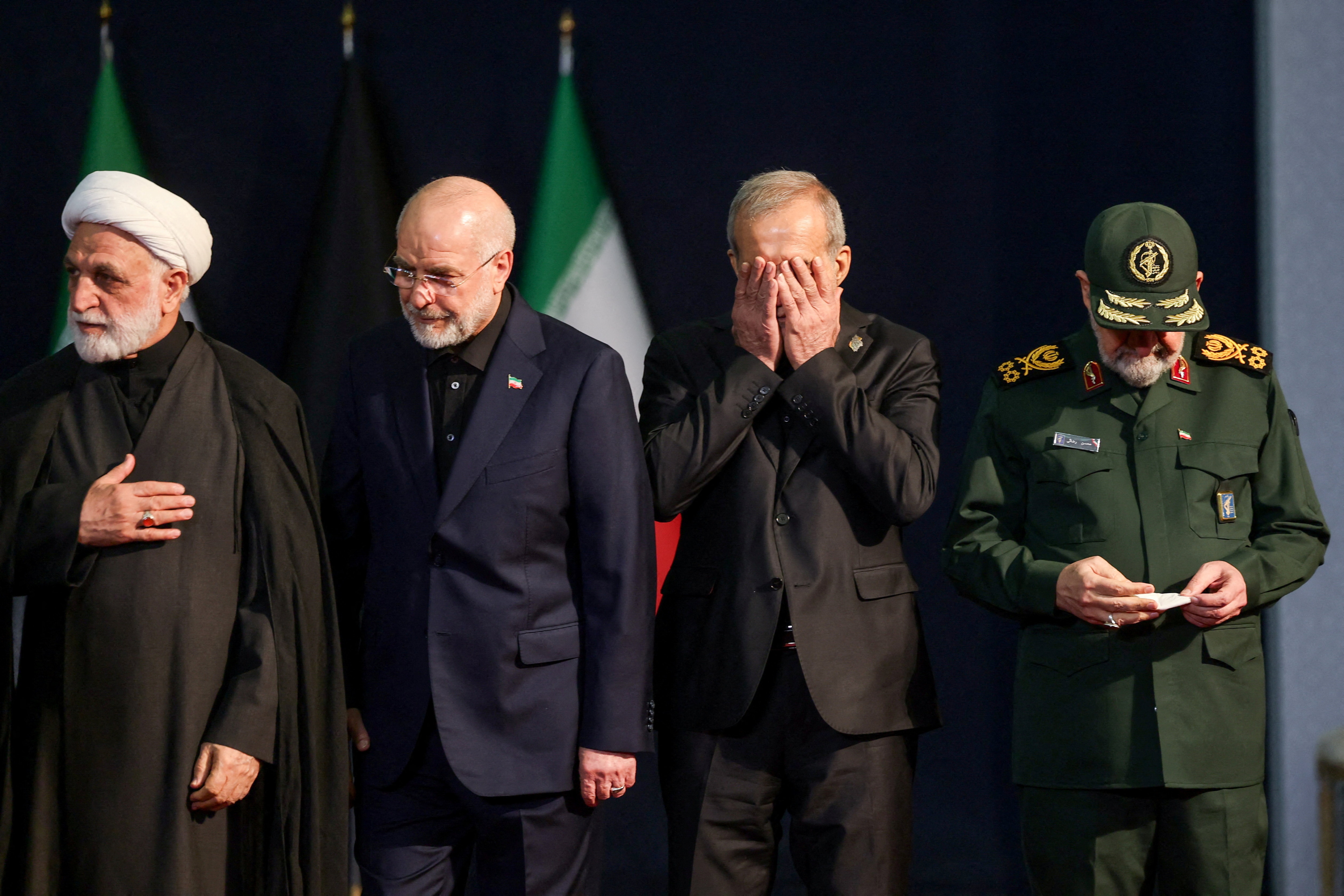 Chief Justice of Iran Gholamhossein Mohseni Ejei, Iran's parliament speaker Mohammad Baqer Qalibaf, Iranian President Masoud Pezeshkian and adviser to Iran's supreme leader Mohsen at Khamenei's funeral. (REUTERS)
