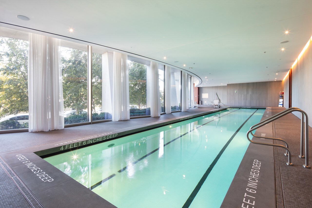Building amenities include a 70-foot indoor pool and catering kitchen.