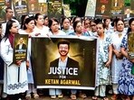 Ketan Agarwal's family members and society residents hold a candlelight march to pay tribute to him in Pune.