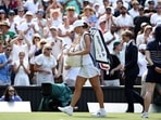 Iga Swiatek leaves the court after being defeated by Alexandra Eala.