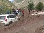 The two vehicles that were trapped in debris after a flashflood triggered a landslide near Choling in Kinnaur district on Friday. (HT Photo) The two vehicles that were trapped in debris after a flashflood triggered a landslide near Choling in Kinnaur district on Friday. (HT Photo)
