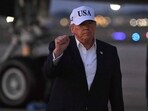 US President Donald Trump gestures toward reporters after disembarking from Air Force One at Joint Base Andrews, Maryland on July 1, 2026. (AFP)
