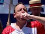 Joey Chestnut received $10,000 for finishing first in the men's competition. REUTERS/Jordan Tovin    