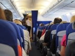 Sitting through a long flight can result in pain in the legs. 