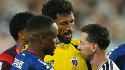 Argentina's Lionel Messi speaks to Cape Verde goalkeeper Vozinha after the World Cup Round of 32 match in Miami on Friday. Argentina won 3-2. (AP) Argentina's Lionel Messi speaks to Cape Verde goalkeeper Vozinha after the World Cup Round of 32 match in Miami on Friday. Argentina won 3-2. (AP)