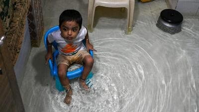 Mumbai, India. July 04, 2026 - Heavy rainfall caused waterlogging in Ramdas Jivabhai Chawl in Kurla West. The India Meteorological Department (IMD) has issued a Red alert for Mumbai, Thane, and Palghar districts. Mumbai, India. July 04, 2026. (Photo by Raju Shinde/HT Photo) (Raju Shinde) Mumbai, India. July 04, 2026 - Heavy rainfall caused waterlogging in Ramdas Jivabhai Chawl in Kurla West. The India Meteorological Department (IMD) has issued a Red alert for Mumbai, Thane, and Palghar districts. Mumbai, India. July 04, 2026. (Photo by Raju Shinde/HT Photo) (Raju Shinde)