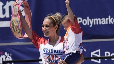 Competitive eater Miki Sudo gives holds cheers with the fans after winning the women's 2026 Nathan's Famous Fourth of July hot dog eating contest at Coney Island in the Brooklyn borough of New York, Saturday, July 4, 2026. (AP Photo/Anna Connors) (AP Photo/Anna Connors) Competitive eater Miki Sudo gives holds cheers with the fans after winning the women's 2026 Nathan's Famous Fourth of July hot dog eating contest at Coney Island in the Brooklyn borough of New York, Saturday, July 4, 2026. (AP Photo/Anna Connors) (AP Photo/Anna Connors)