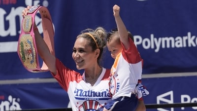 Competitive eater Miki Sudo gives holds cheers with the fans after winning the women's 2026 Nathan's Famous Fourth of July hot dog eating contest at Coney Island in the Brooklyn borough of New York, Saturday, July 4, 2026. (AP Photo/Anna Connors) (AP Photo/Anna Connors) Competitive eater Miki Sudo gives holds cheers with the fans after winning the women's 2026 Nathan's Famous Fourth of July hot dog eating contest at Coney Island in the Brooklyn borough of New York, Saturday, July 4, 2026. (AP Photo/Anna Connors) (AP Photo/Anna Connors)