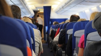 Sitting through a long flight can result in pain in the legs. (Pexel) Sitting through a long flight can result in pain in the legs. (Pexel)