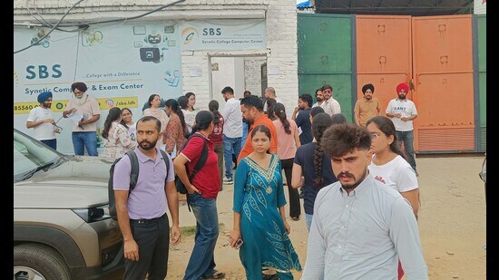 Students outside the examination centre at SBS Synetic College on Chandigarh Road after appearing for ICAR exam in Ludhiana. (HT Photo)