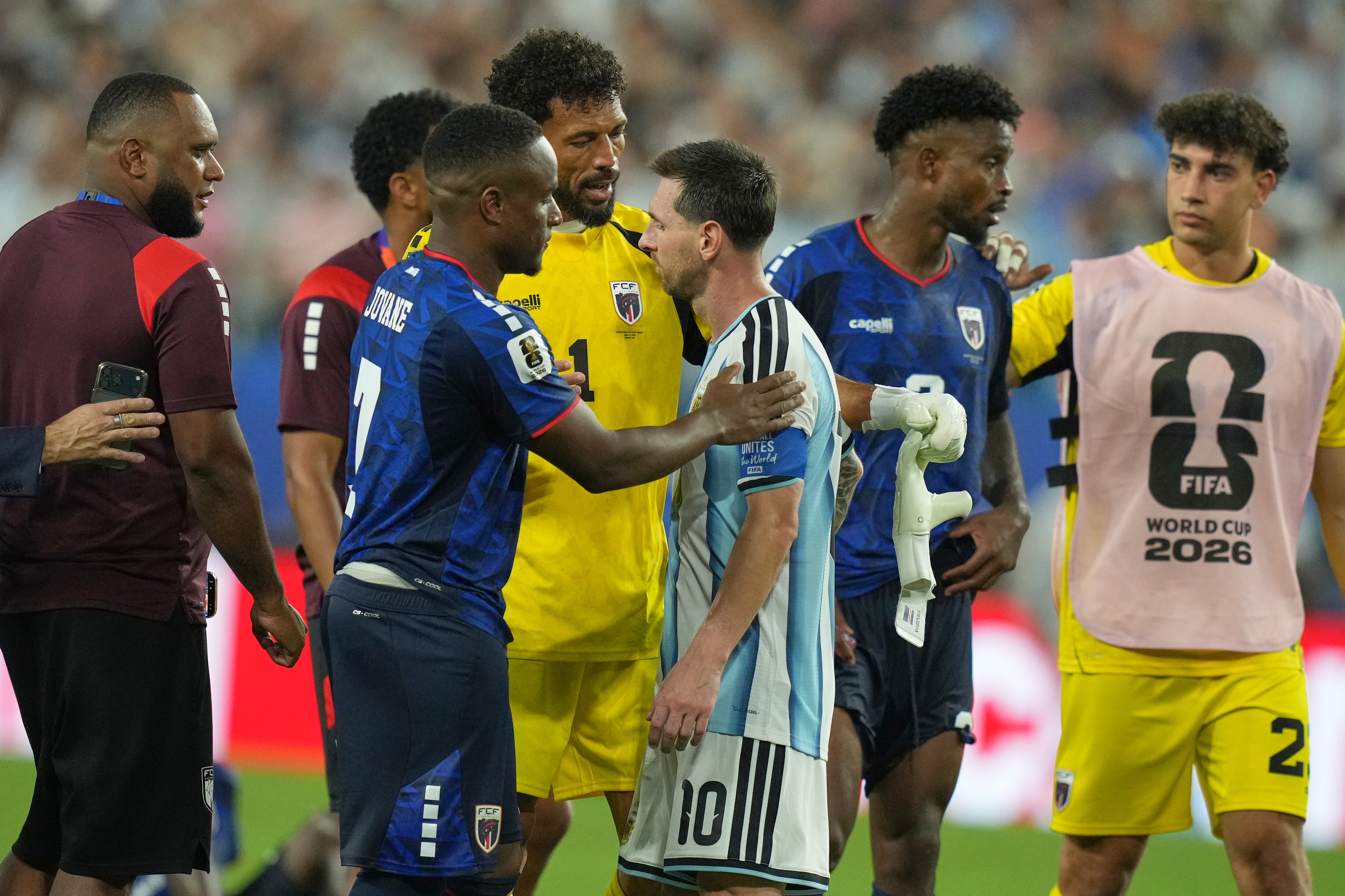 Vozinha and Lionel Messi embraced each othr after the match. (AP Photo) Vozinha and Lionel Messi embraced each othr after the match. (AP Photo)