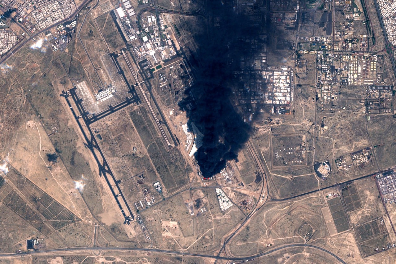 Smoke spreads over Kuwait International Airport after a drone attack in late March. Smoke spreads over Kuwait International Airport after a drone attack in late March.