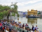 File photo of Sewadar or SGPC employees perform the "sewa" of pruning the "Dukh Bhanjani Beri", a sacred 400-year-old jujube tree at the Golden Temple. (Photo for representation)