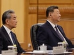 Chinese President Xi Jinping, right, and Foreign Minister Wang Yi attend a meeting with Bangladesh's Prime Minister Tarique Rahman at the Great Hall of the People, in Beijing, China Friday, June 26, 2026.(TINGSHU WANG/Pool Reuters via AP)