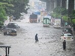 Heavy rainfall caused waterlogging on the Andheri-Ghatkopar road at Sakinaka on Saturday. (Raju Shinde/HT Photo)