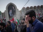 A mourner weeps during the funeral ceremonies for slain Iranian Supreme Leader Ayatollah Ali Khamenei and members of his family at the Imam Khomeini Mosalla Grand Mosque in Tehran, Iran.