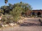 The home of Nancy Guthrie, the missing mother of "Today" show host Savannah Guthrie, pictured on Friday, March 6, 2026, in Tucson, Ariz. (AP Photo/Rebecca Noble)