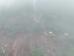 Nearly 100 tourists were stranded on Rajmachi route near Lonavla on Saturday after landslide triggered by incessant monsoon rain blocked the only motorable road with debris. (HT) Nearly 100 tourists were stranded on Rajmachi route near Lonavla on Saturday after landslide triggered by incessant monsoon rain blocked the only motorable road with debris. (HT)