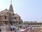 People attend the 'Dhwajarohan' ceremony at the Ram Temple, in Ayodhya, Uttar Pradesh. 
