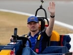 Red Bull driver Max Verstappen of the Netherlands drives Lego replica F1 car during driver's parade prior to the British F1 Grand Prix, in Silverstone, England, Sunday, July 5.