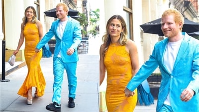 Ed Sheeran kept it classic in a bright blue suit, while wife Cherry Seaborn complemented him in a goldenrod dress. (Instagram)