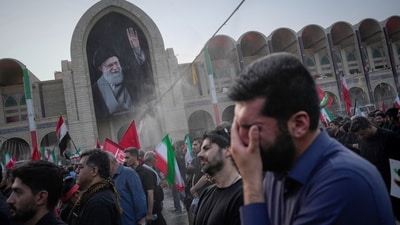 A mourner weeps during the funeral ceremonies for slain Iranian Supreme Leader Ayatollah Ali Khamenei and members of his family at the Imam Khomeini Mosalla Grand Mosque in Tehran, Iran. (Altaf Qadri/AP Photo) A mourner weeps during the funeral ceremonies for slain Iranian Supreme Leader Ayatollah Ali Khamenei and members of his family at the Imam Khomeini Mosalla Grand Mosque in Tehran, Iran. (Altaf Qadri/AP Photo)