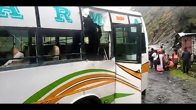 The boulder-hit bus, on Sunday. (HT Photo) The boulder-hit bus, on Sunday. (HT Photo)