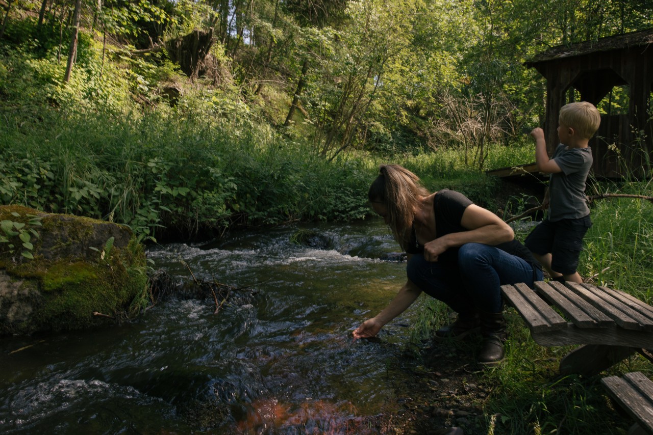 April Risk and her son, Zaden, playing along a creek in Lakeside. April Risk and her son, Zaden, playing along a creek in Lakeside.