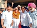 AAP’s Hoshiarpur MLA Brahm Shankar Jimpa (second from right) celebrating his brother Rajeshwar Dyal Babbi’s victory in the Hoshiarpur municipal corporation elections on Sunday. (HT)
