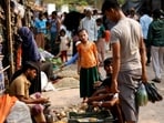 At least eight Rohingya Muslims were killed in landslides as heavy monsoon rains engulf Bangladesh